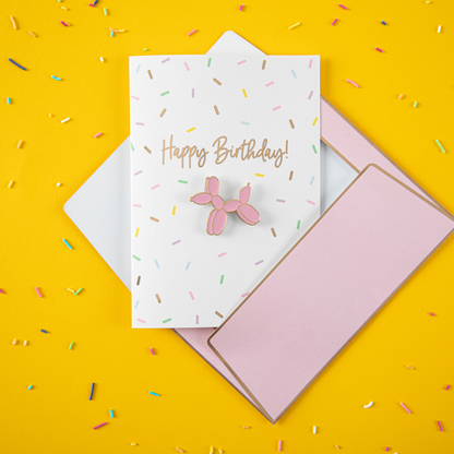 happy birthday card with pink balloon dog pin and pink envelope 