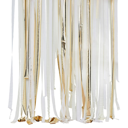 gold and cream hanging streamer backdrop