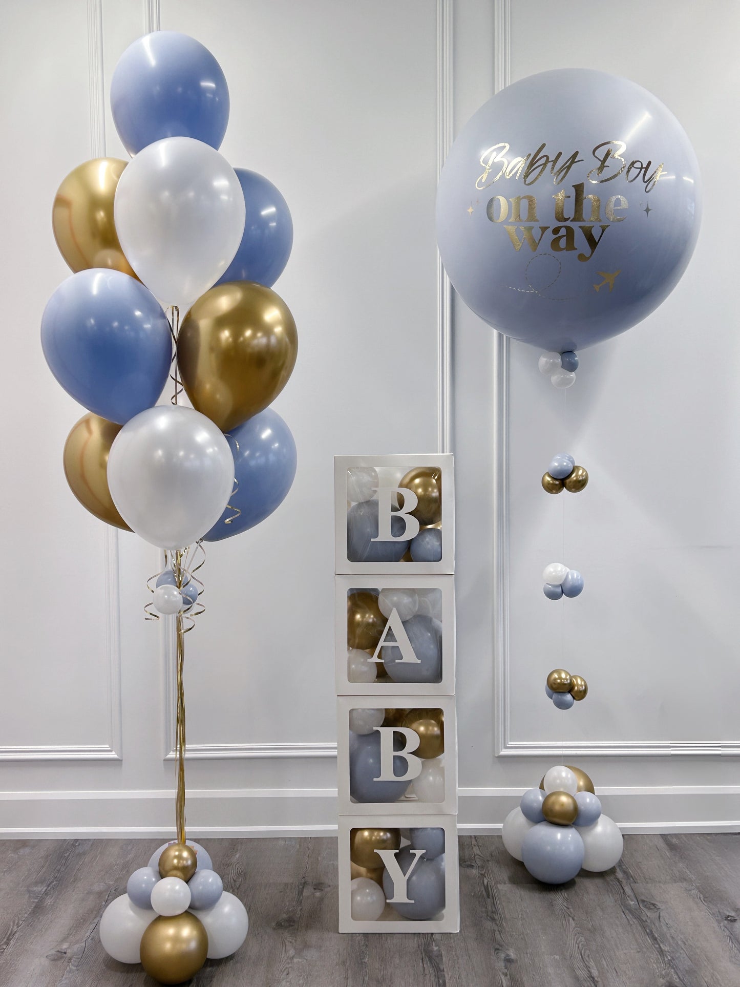 baby boy themed balloon bundles with 'baby' boxes 