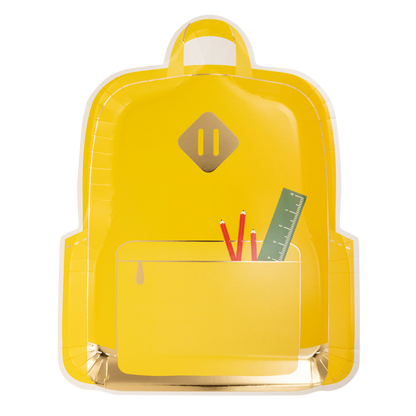 a yellow backpack shaped paper party plate with pencils and a ruler in the front pocket