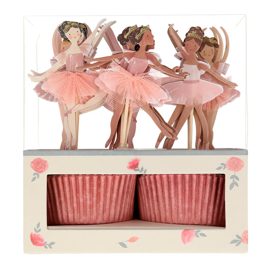 cupcake toppers featuring ballerinas in different ballet poses - some dresses featuring tulle accents