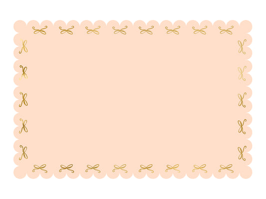 scalloped pink paper table cloth with gold foil bows 