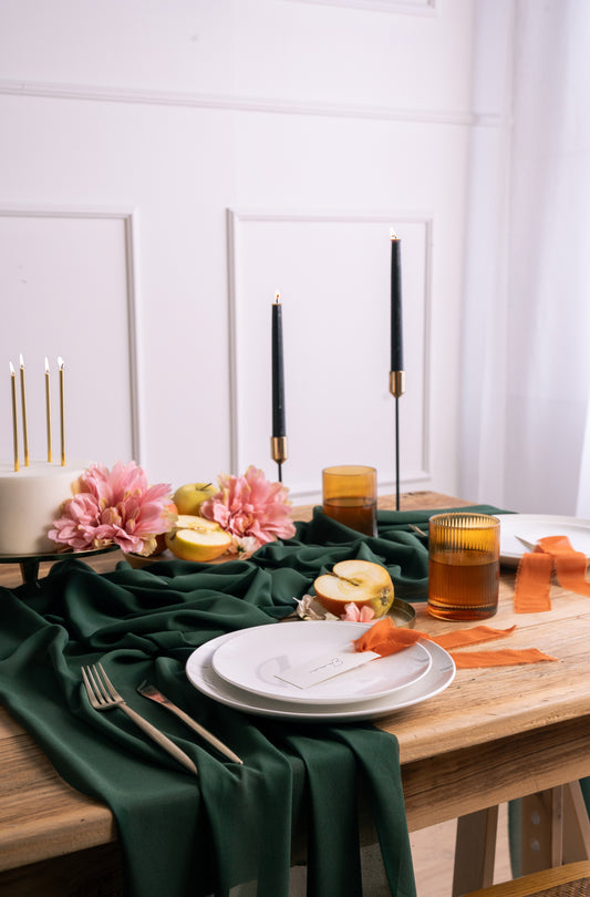 bottle green chiffon table runner with matching decor 