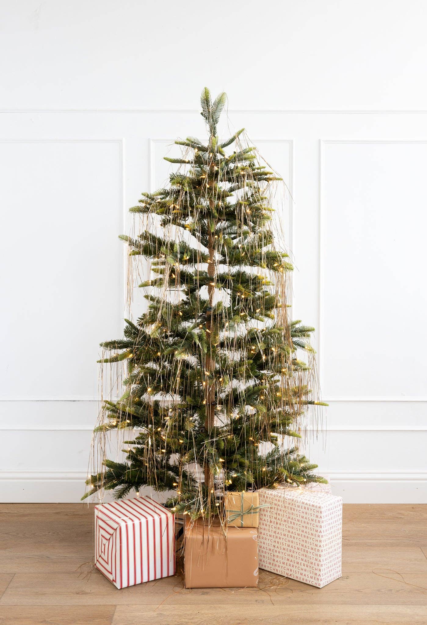 Christmas tree decorated with Gold tinsel 