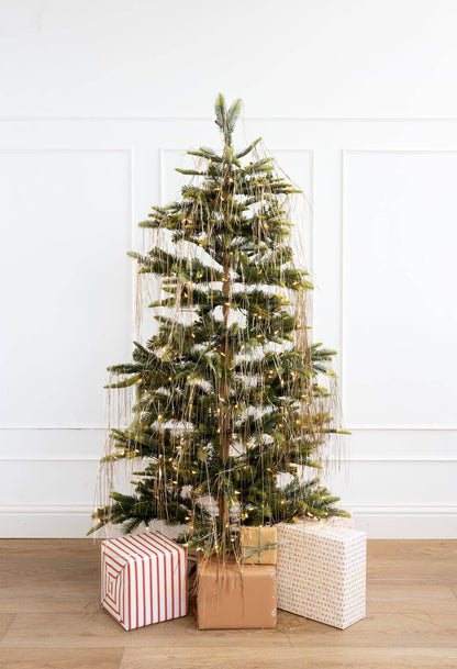 Christmas tree decorated with Gold tinsel 