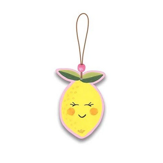 lemon shaped car air freshener with smiling face and blushing face