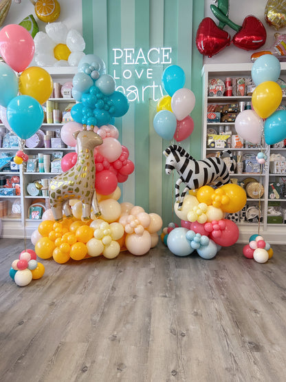 colourful party animal balloon garland and helium balloon bundles to match 