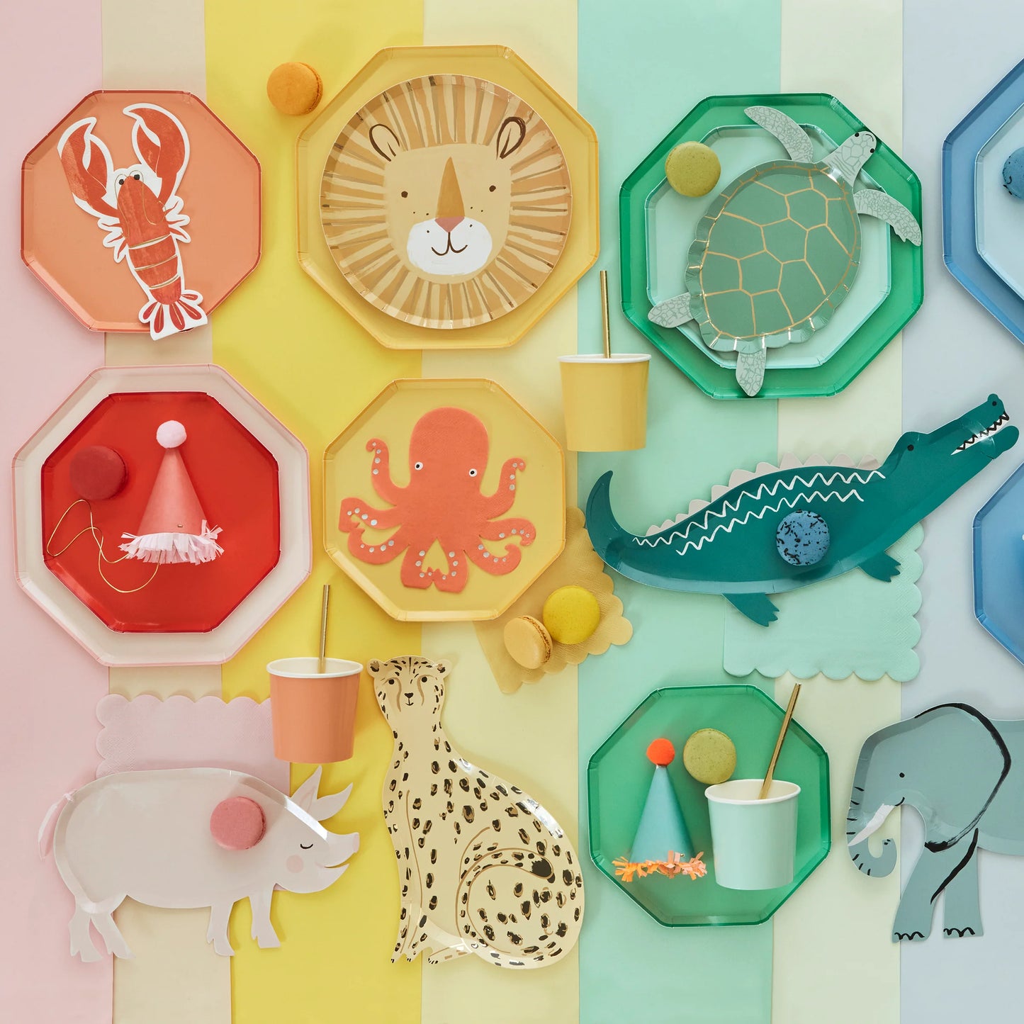 mix and match colourful party supplies featuring animal shaped plates