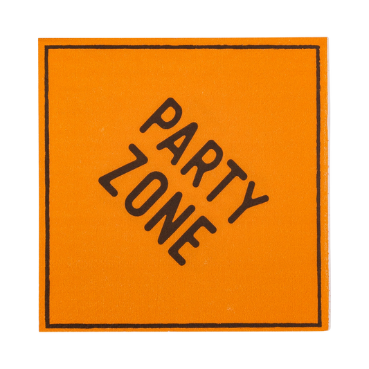 Orange square napkin resembling a construction sign with 'paper zone' message in black.