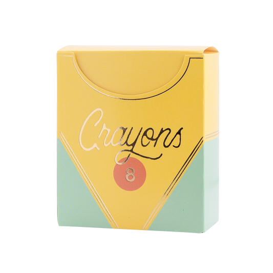 yellow treat box made to resemble a crayon box with gold accents and 'crayons' in gold stylized text