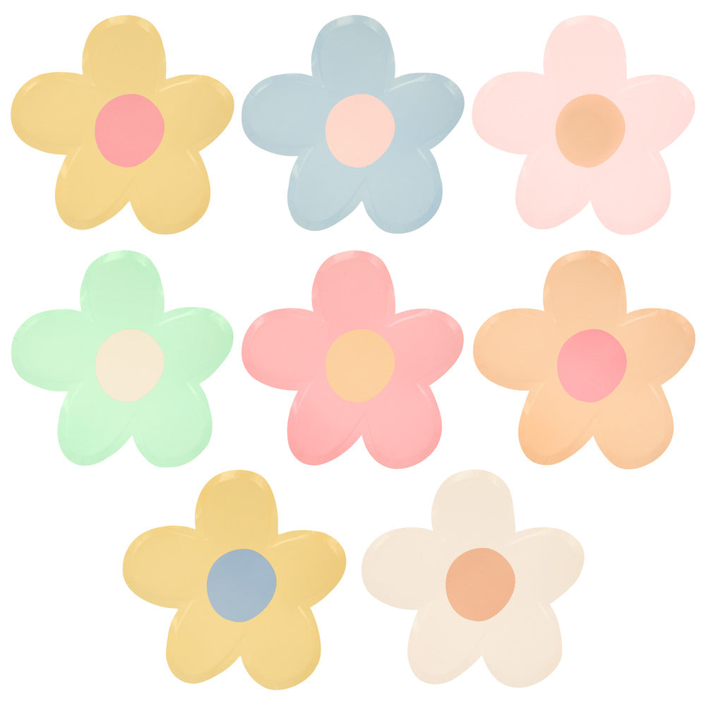 multicoloured daisy plates on a white background