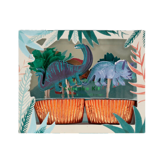 box of cupcake toppers and cases with dinosaur icons