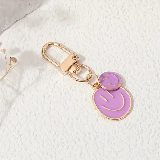 double happy face keychain in purple
