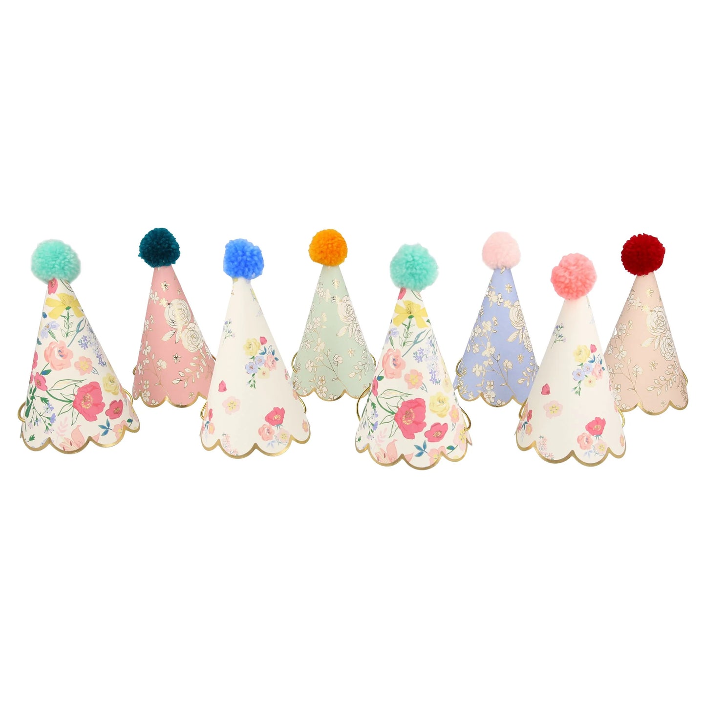 A row of paper party hats with floral designs and pom poms.