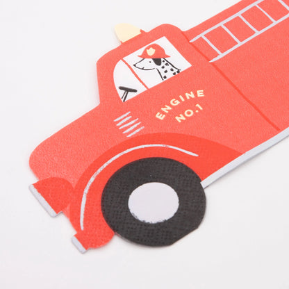 a paper die-cut napkin in the shape of a fire engine