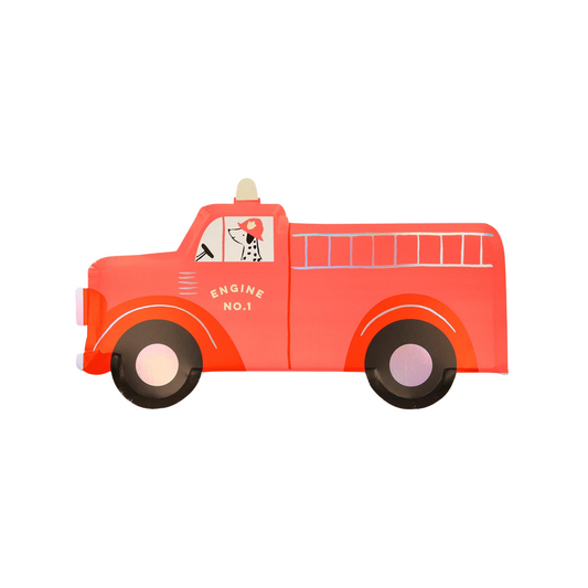 a paper party plate in the shape of a fire engine with a dalmatian dog driving.