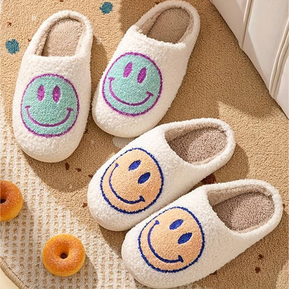 FUZZY HAPPY FACE SLIPPERS - LIGHT BLUE + PURPLE