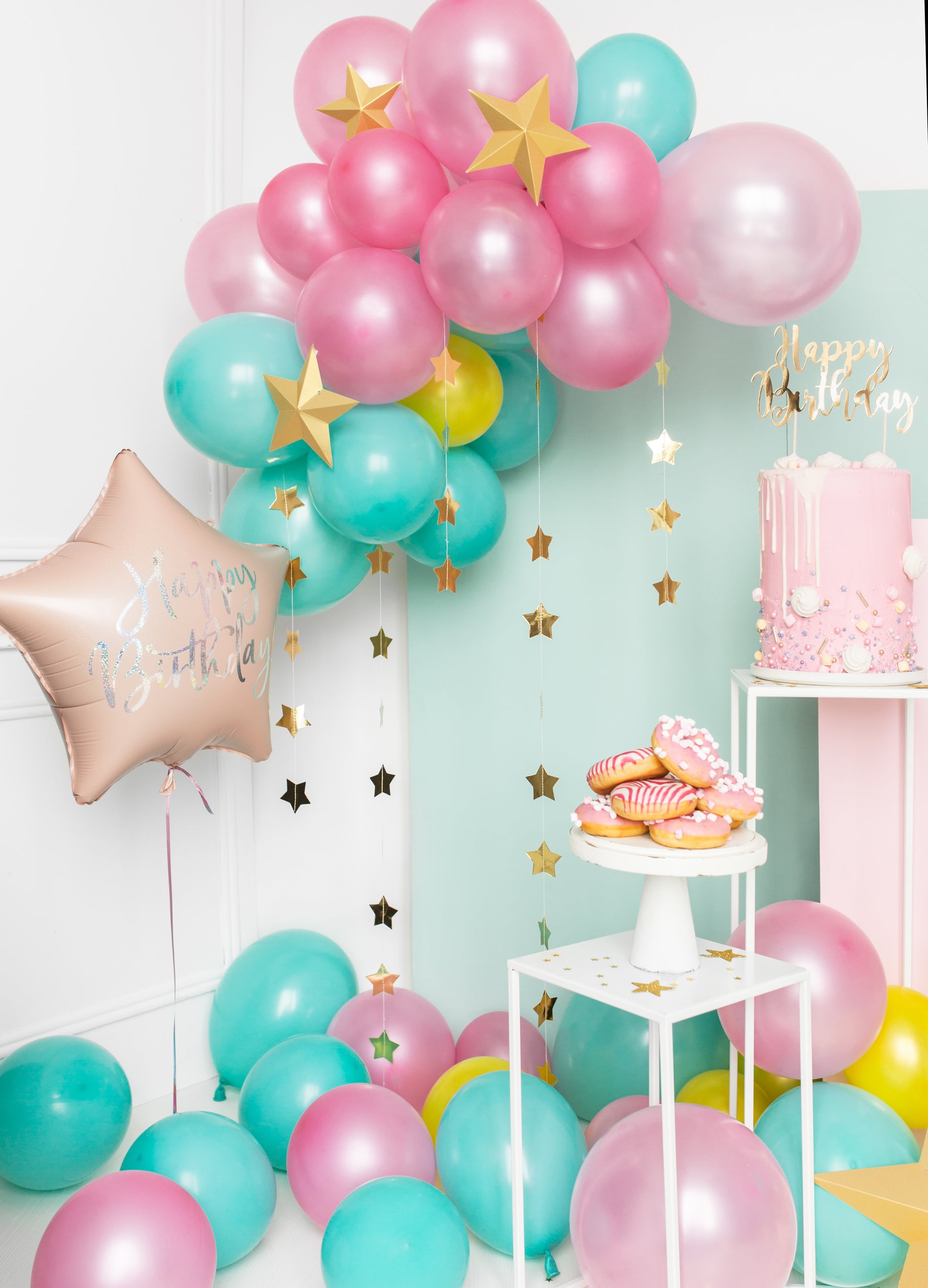 cloud balloon garland with gold foil star banner hanging down