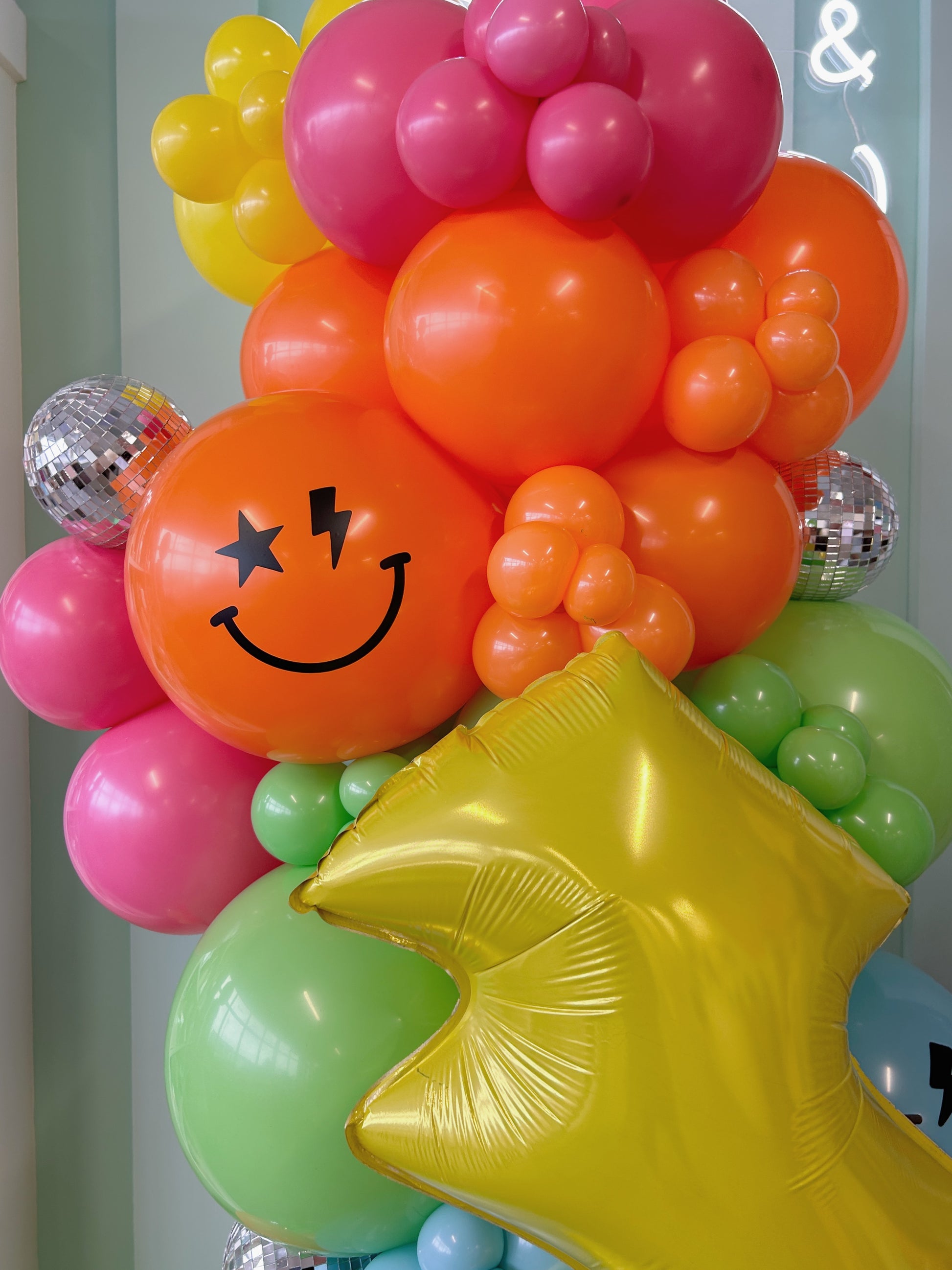 good vibes groovy disco and smiley face balloon garland