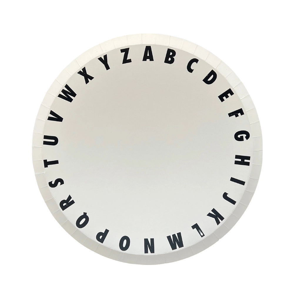 dinner plate with black lowercase alphabet letters around edge