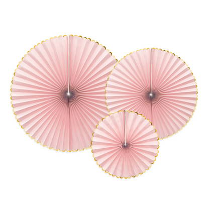 three light pink paper party fans