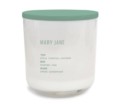 Mary Jane home candle- Fragrance: An intoxicating blend of cannabis accord with natural herbal greens, rich, sophisticated notes of rose, dark woods, exotic cinnabar, fresh citrus, and oriental amber. Essential oils of rosemary and patchouli in a creamy coconut-soy blend wax.