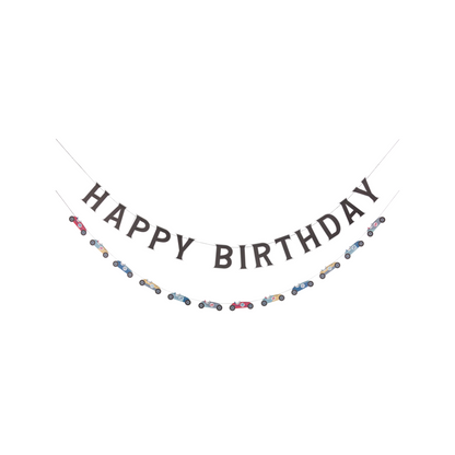 Two hanging banners: one with 'HAPPY BIRTHDAY' cut-out letters, and the other featuring vintage race car icons in various colours