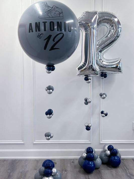 personalized jumbo dark grey latex balloon with silver number 12 