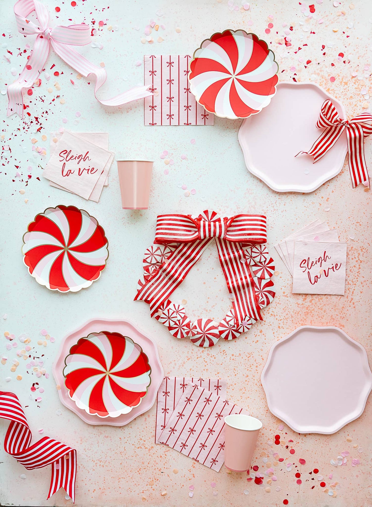 petal pink dinner plates paired with matching party supplies 