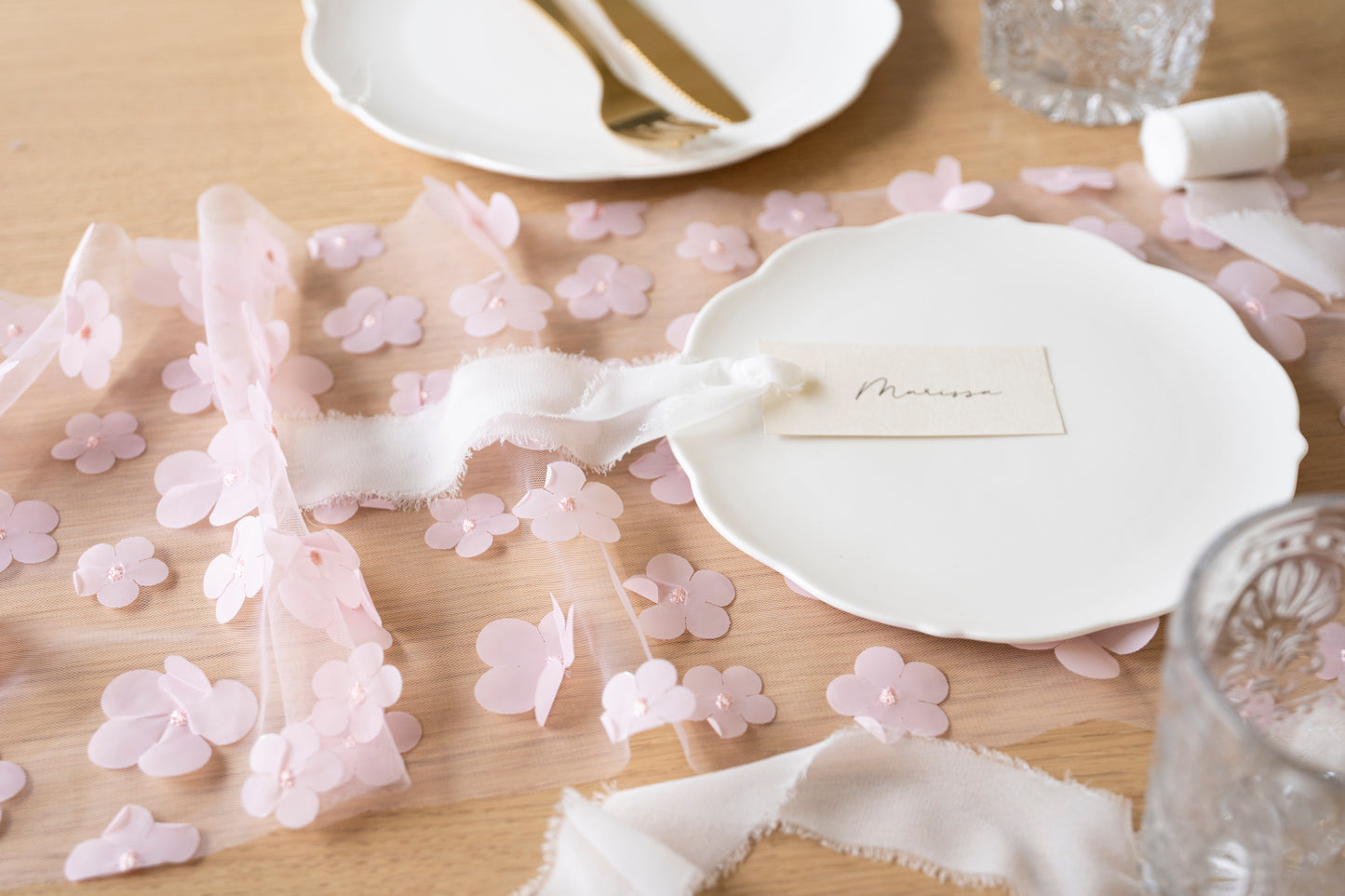 pink floral table runner with matching plate setting 