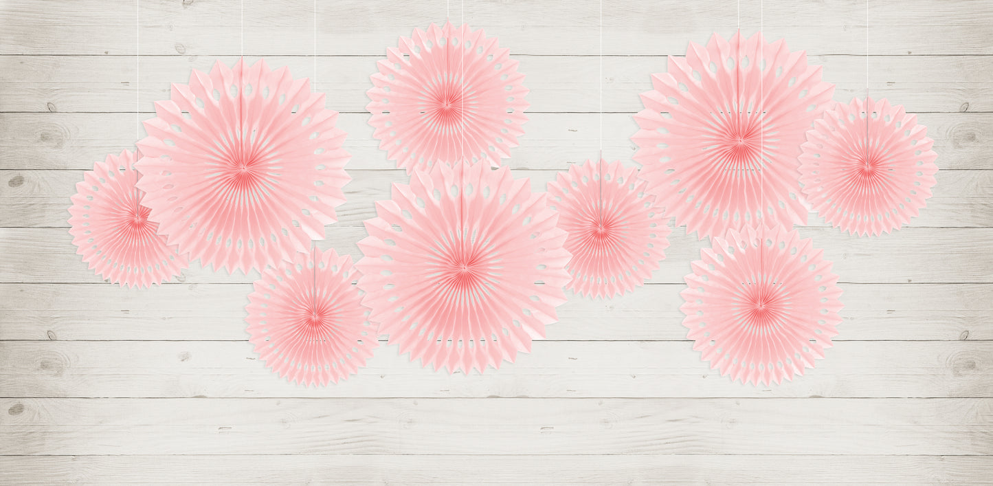 9 hanging powder pink party fans in varying sizes