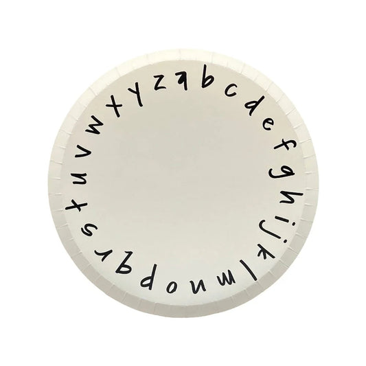 white dessert plate with black lowercase alphabet letters around edge