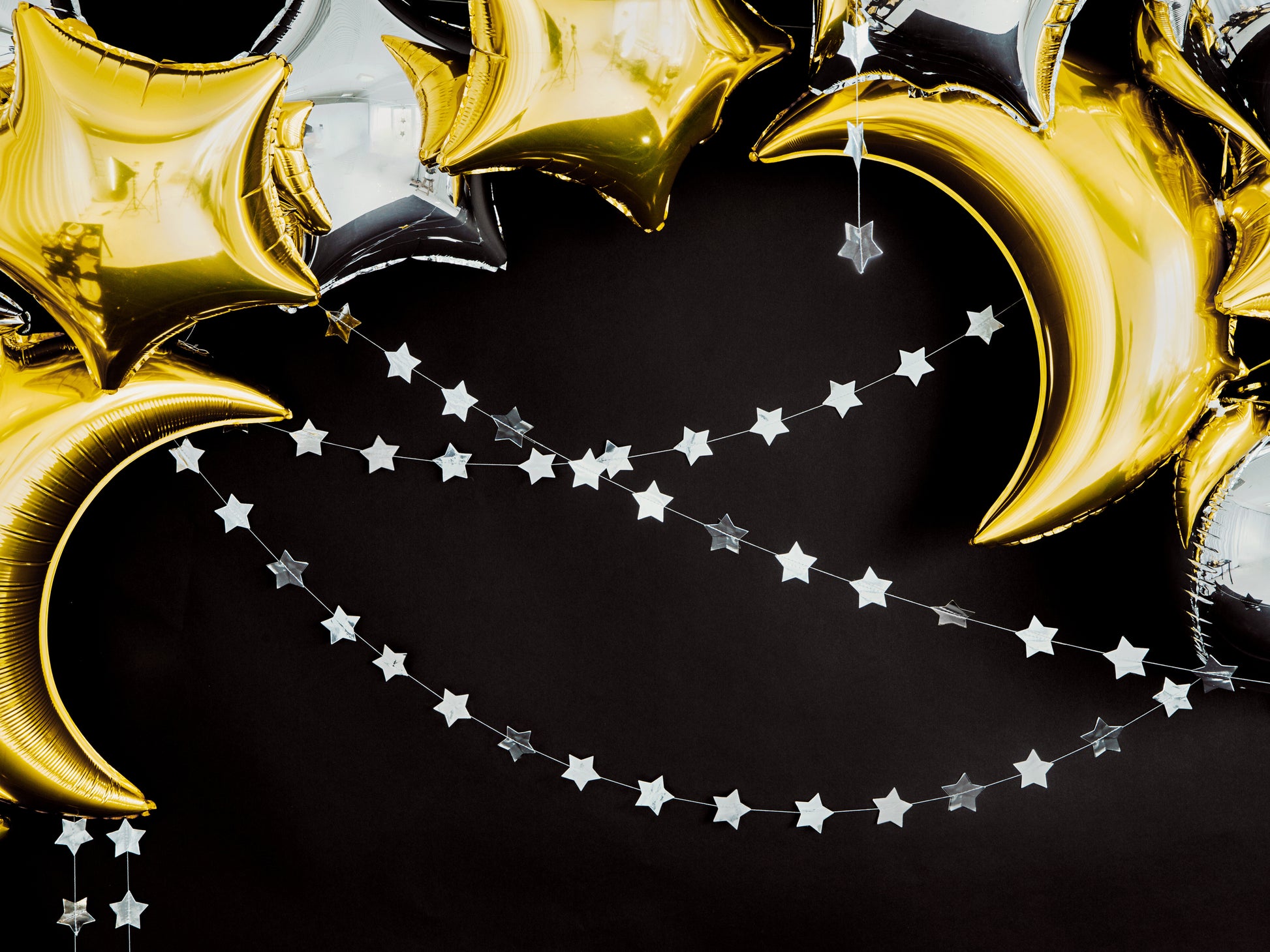 silver star banner with foil stars and moon balloons