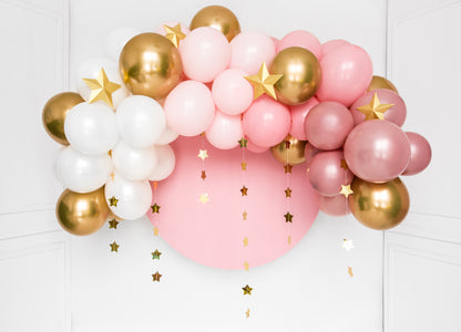 cute pink balloon garland with gold star garland hanging down