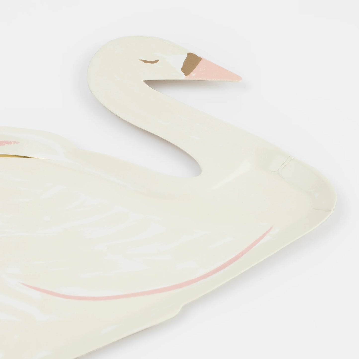 detail of swan shaped party plate with pink and gold details