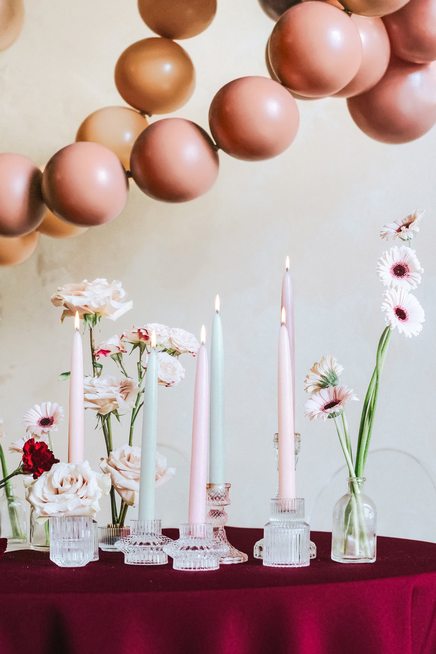 mixed tapered candles displayed