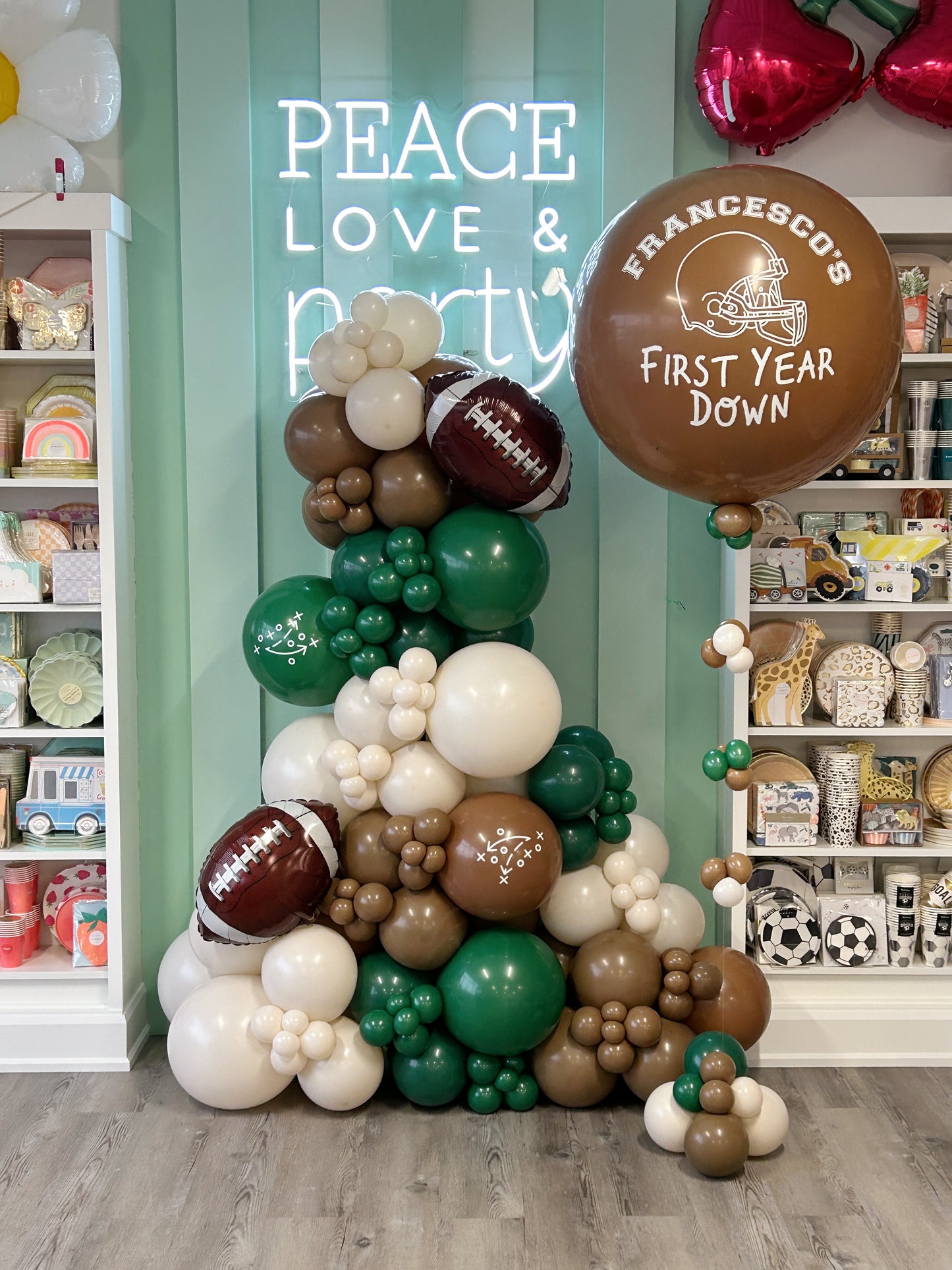 green and brown personalized football garland