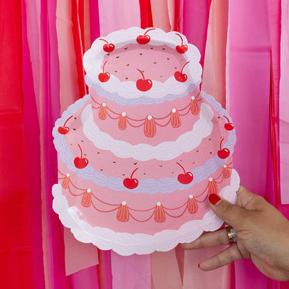 cake shaped plate in vintage style with two tiers and cherry accents 